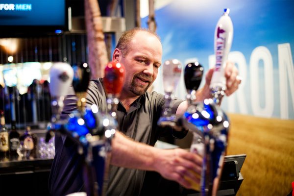 Hockey legend Wendel Clark served 68 beers at last night&apos;s Maple Leafs game during first of three Dove Men+Care® Real Man Challenges (Zach Slootsky for Dove Men+Care) (CNW Group/Dove)